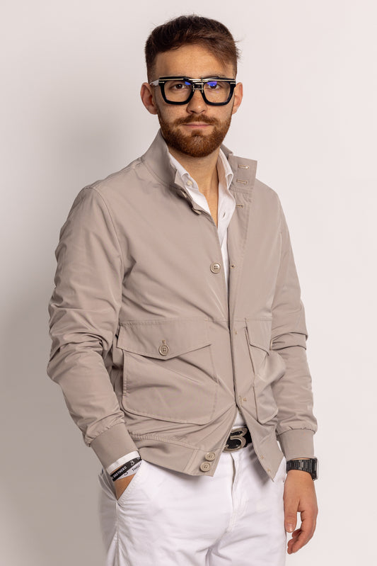 Multi-pocket bomber jacket in technical fabric | Sand