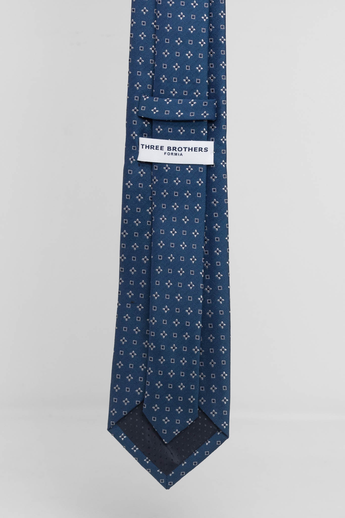 Cravatta Tre Pieghe Rombetti e Fiori Fondo Avion | 2 Per €20