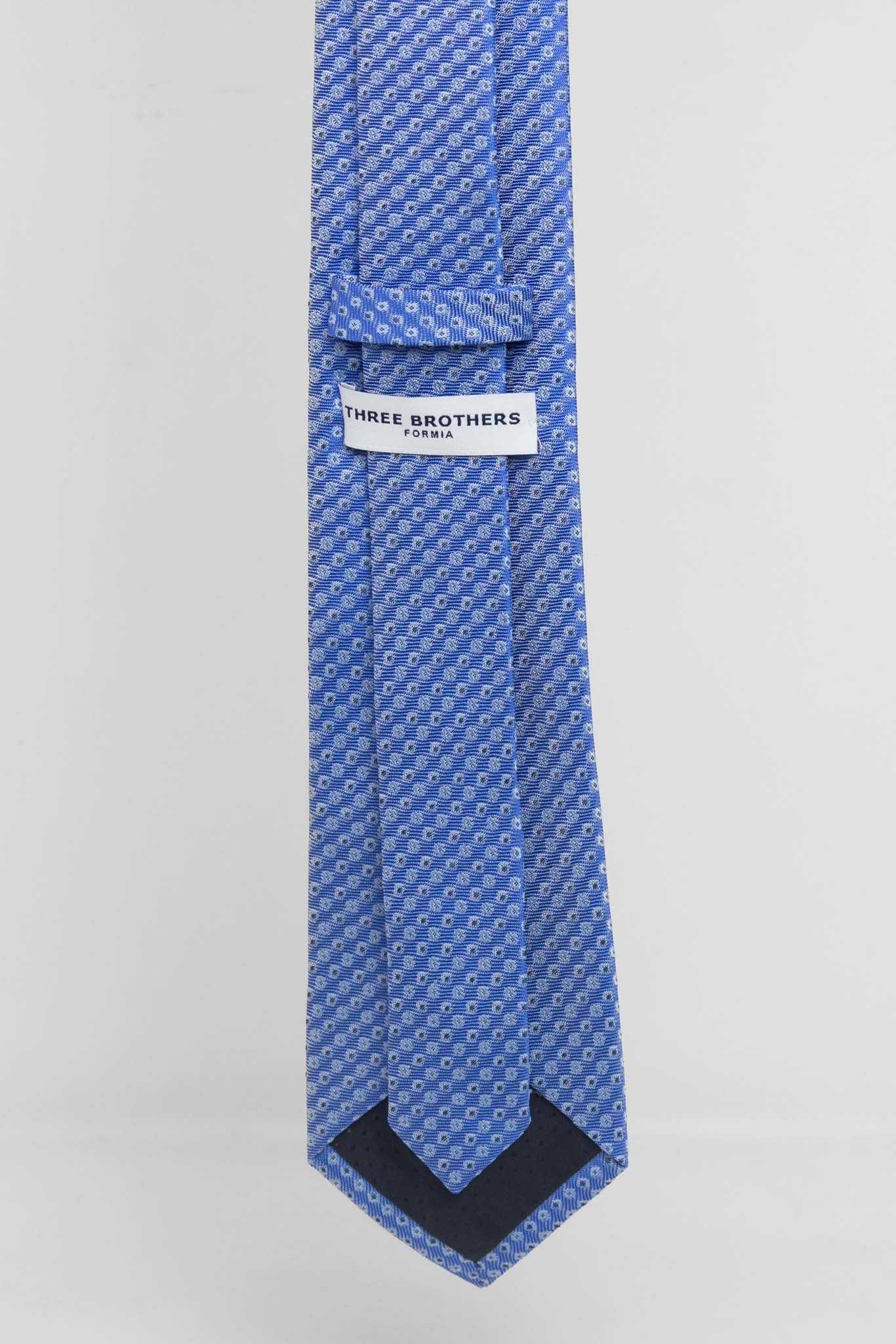 Cravatta Tre Pieghe Fantasia Unica Fondo Celeste e Blu | 2 Per €20